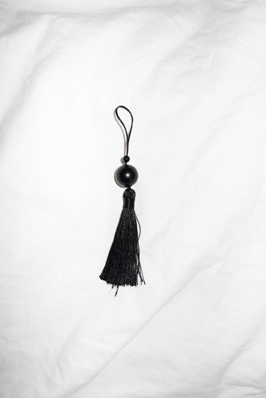 Tassle Charm with a Black Obsidian Stone