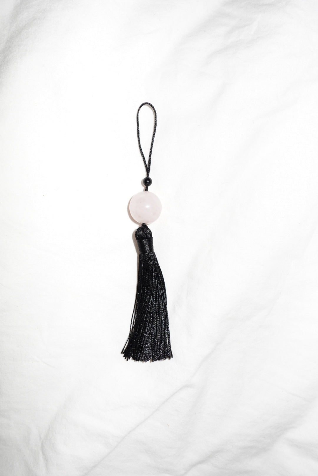 Tassle Charm with a Rose Quartz Stone