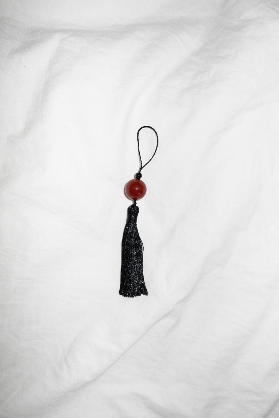 Tassle Charm with a Red Agate Stone Stone