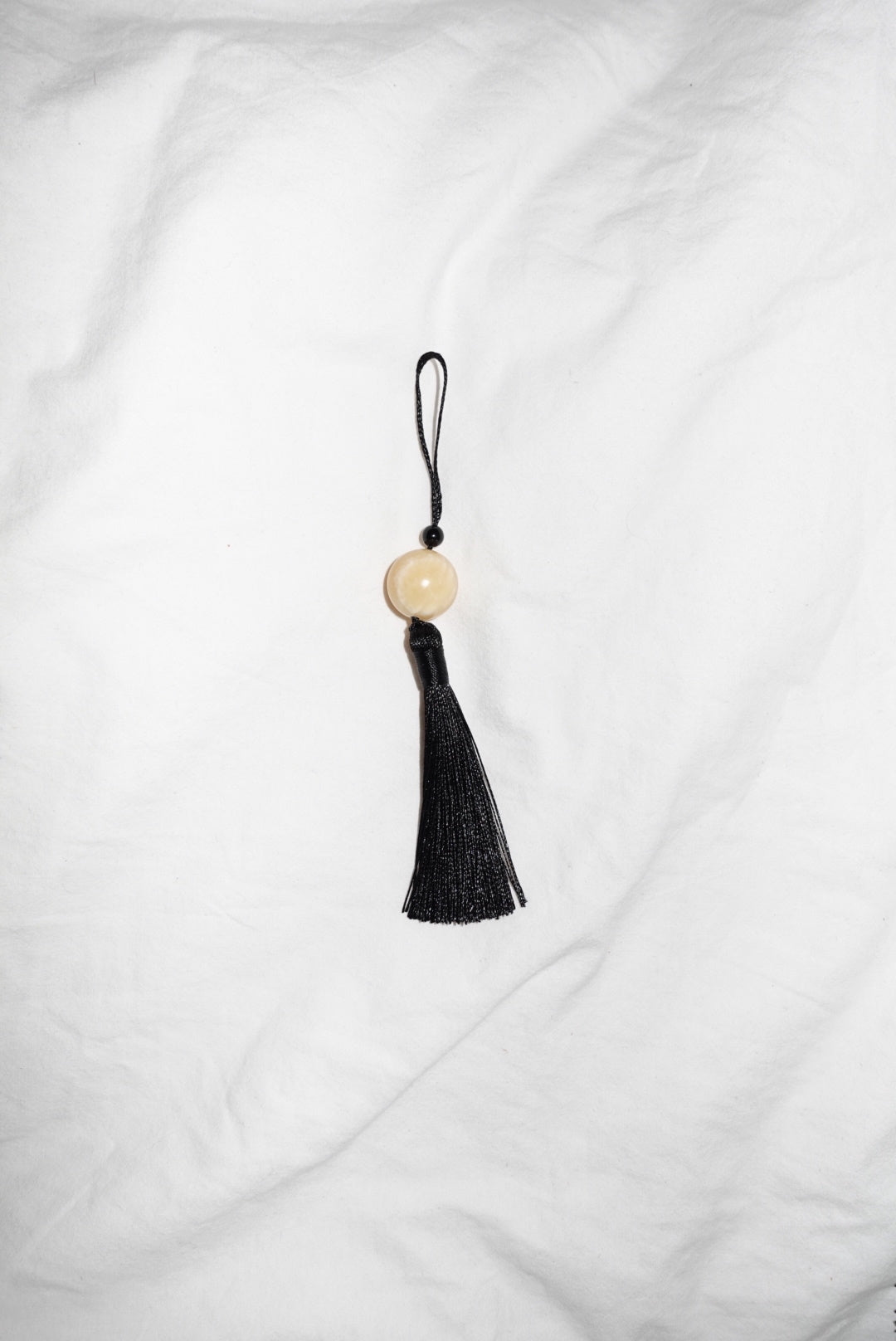 Tassle Charm with a Yellow Calcite Stone